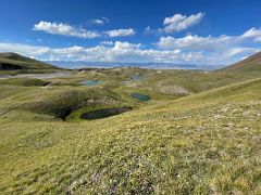 04C Small lakes dot the green fields near Ak-Sai Travel Lenin Peak Base Camp 3600m